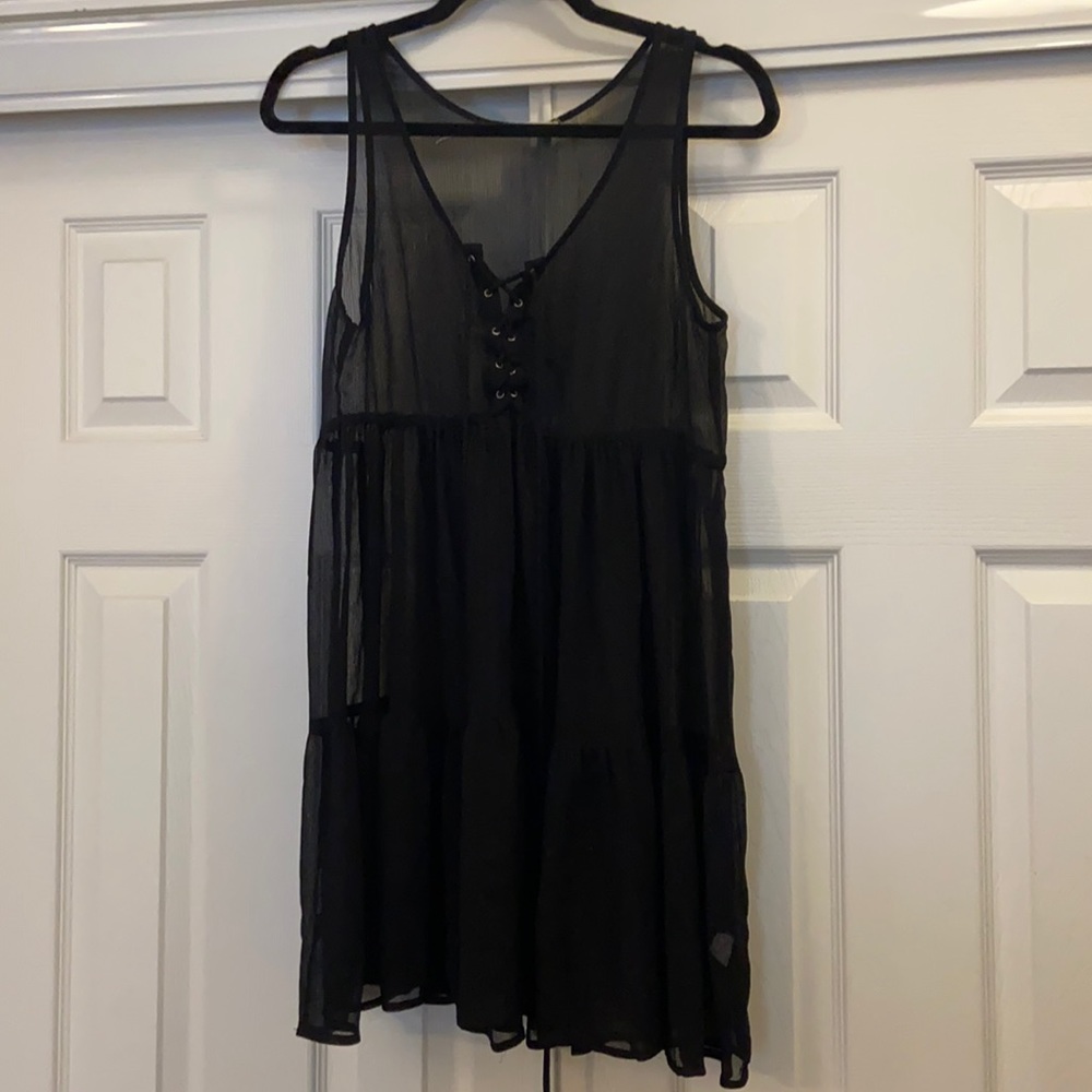 Sheer sleeveless tunic. Size medium